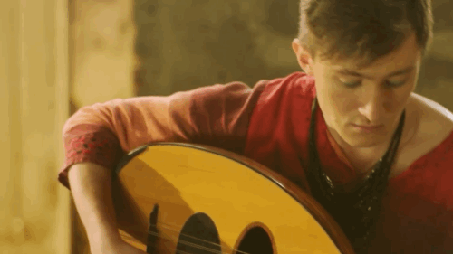 Vientos band live performance animated GIF showing energetic Latin folk rock performance with crowd dancing